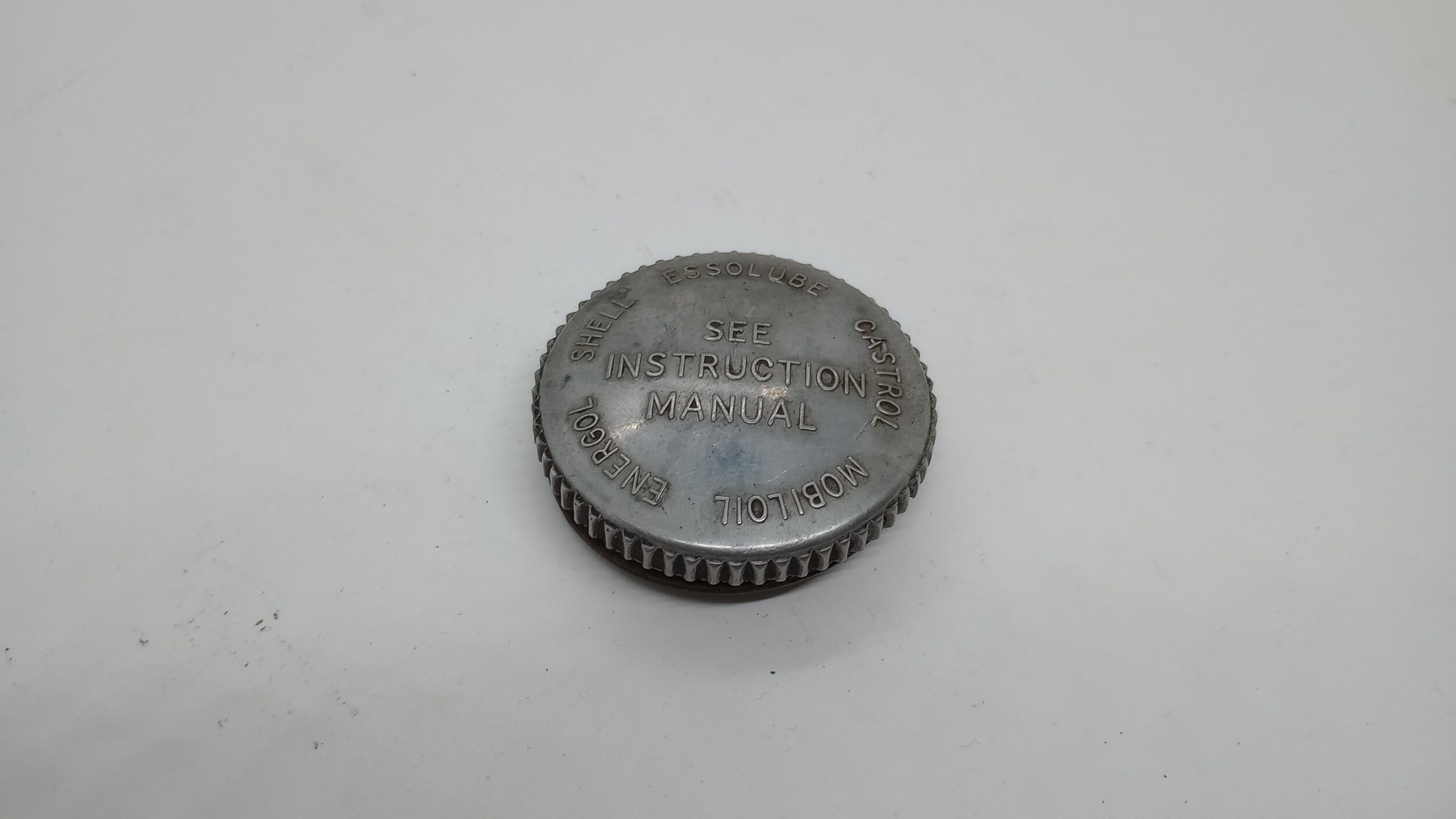 65-8500U Oil Tank Cap, With Writing USED