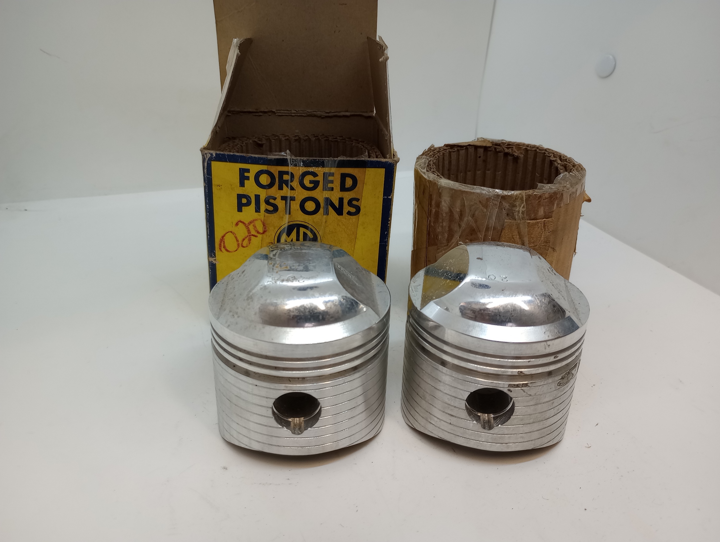 NOS MC Brand High Compression piston set.
